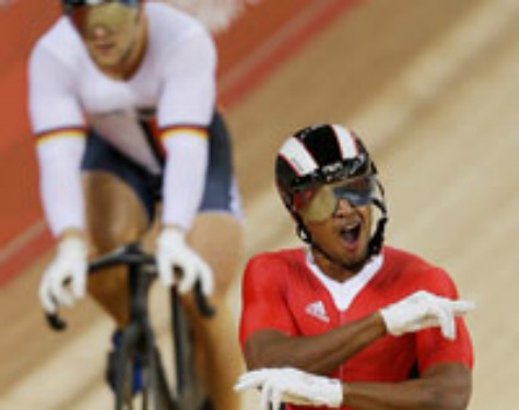 ONE TO NOTE: Trinidad and Tobago's Njisane Nicholas Phillip celebrates after defeating Germany's Robert Forstemann, background, during a men's sprint event, at the 2012 Summer Olympics, on Saturday, in London –Photo: AP